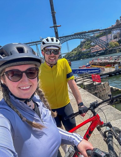 Two cyclists biking from Minho to Porto in Portugal