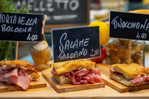 italian deli selling sandwiches with meat