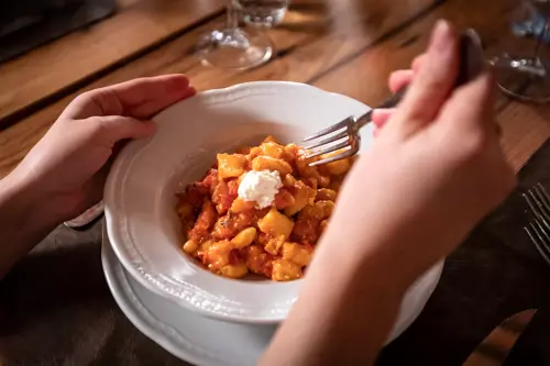 hearty italian meal of pasta with cheese on top