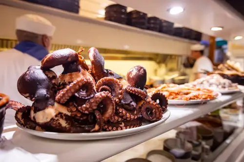 octopus on place in italian restaurant kitchen